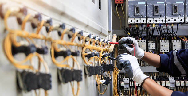 Professional Electrician technician working in East Northport, NY